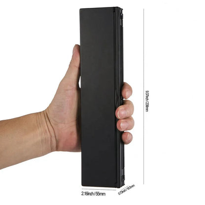 Black folding Bluetooth keyboard for tablets showing compact 5.8-inch size with wrist support extended