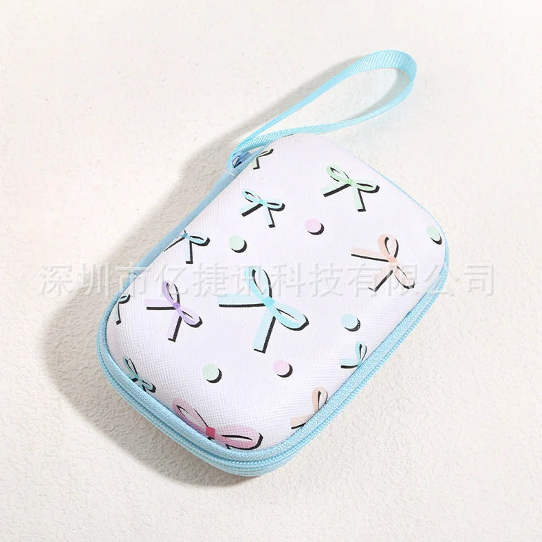 Square hard shell EVA cable storage bag with zipper, 11x8x4cm dimensions, showing Bunny Plaid design variant