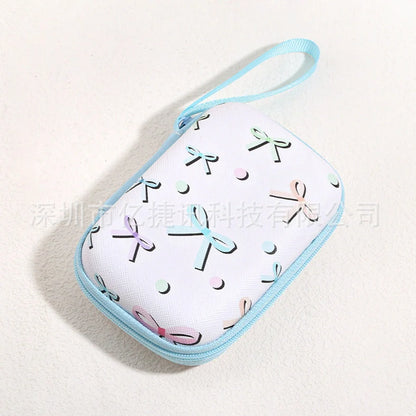 Square hard shell EVA cable storage bag with zipper, 11x8x4cm dimensions, showing Bunny Plaid design variant