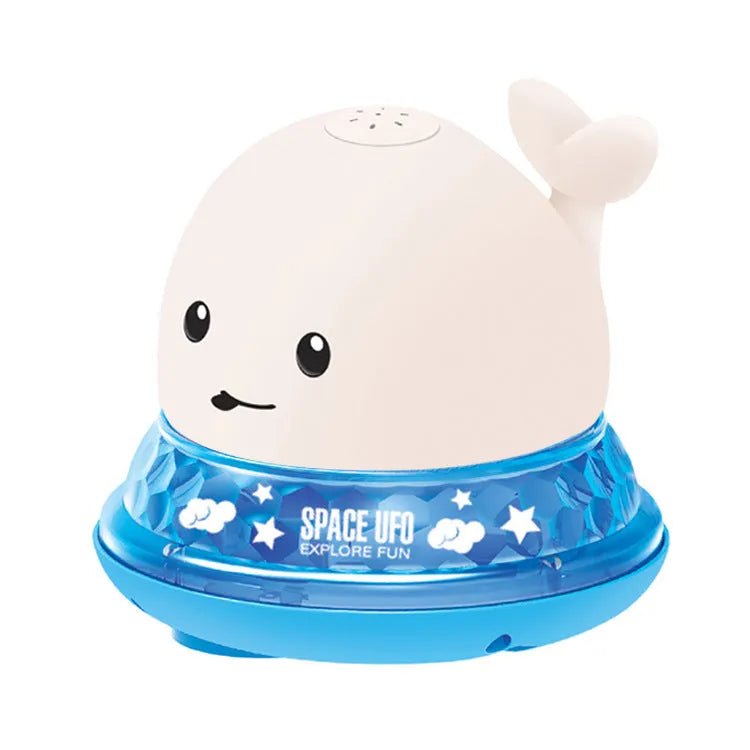 Automatic water-spraying whale bath toy with colourful lights floating in bath water.