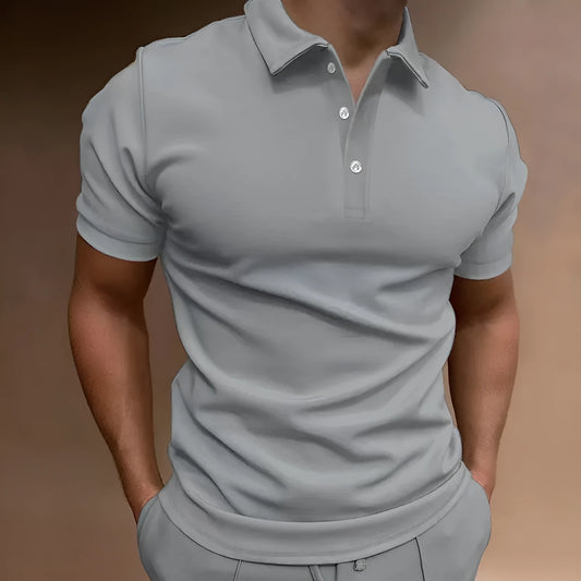 Men's grey loose-fit cotton blend t-shirt with a button detail and short sleeves.
