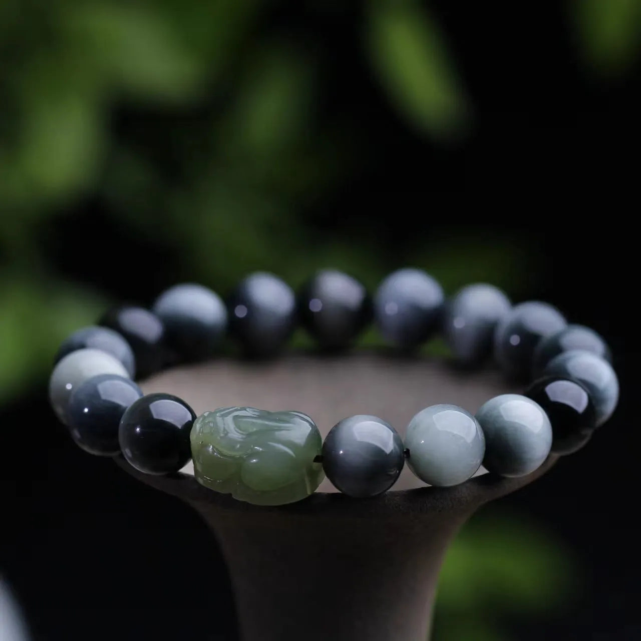 Black bracelet with 10mm Eagle Eye Stone beads and genuine Hetian jade Pixiu pendant
