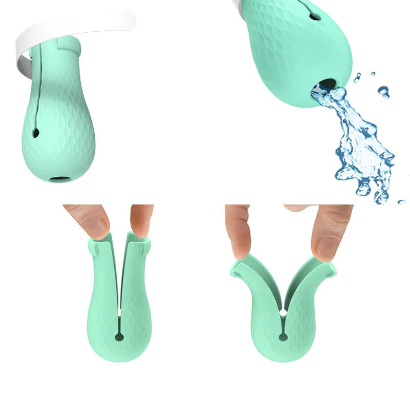 Four transparent green silicone cat paw covers for scratch protection during grooming and care
