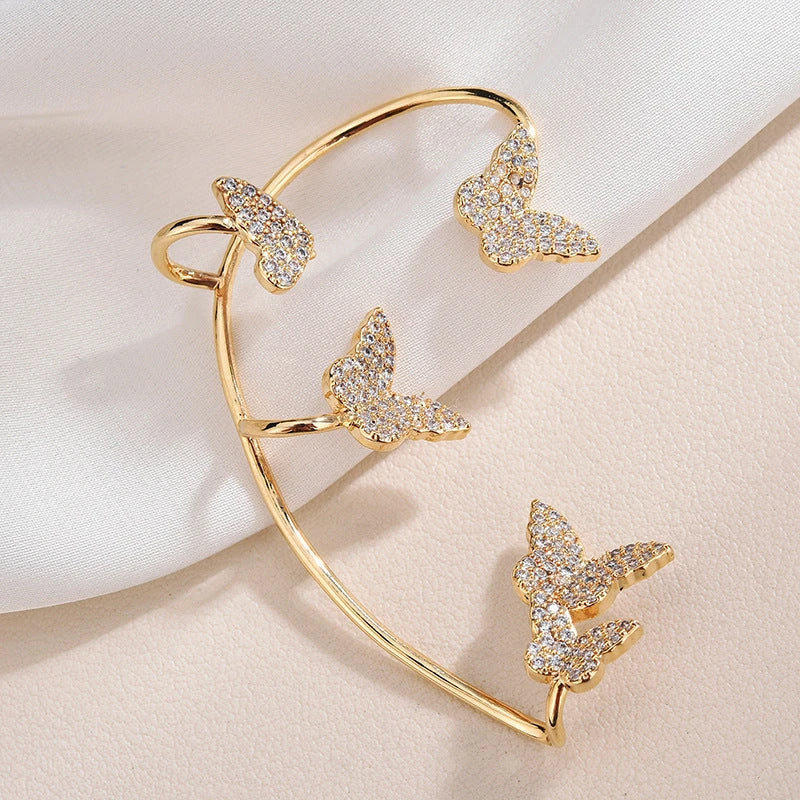 Stylish butterfly ear clips with sparkling zircon stones in gold and silver finishes