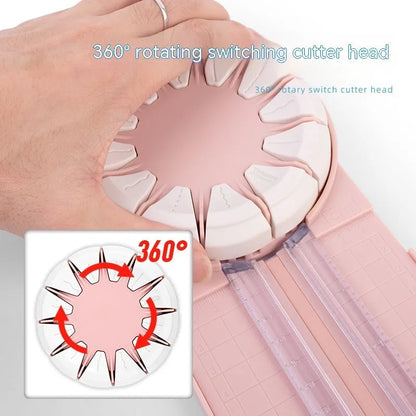 Pink 12-in-1 paper cutter with dotted guides measuring 46.2cm length on craft table