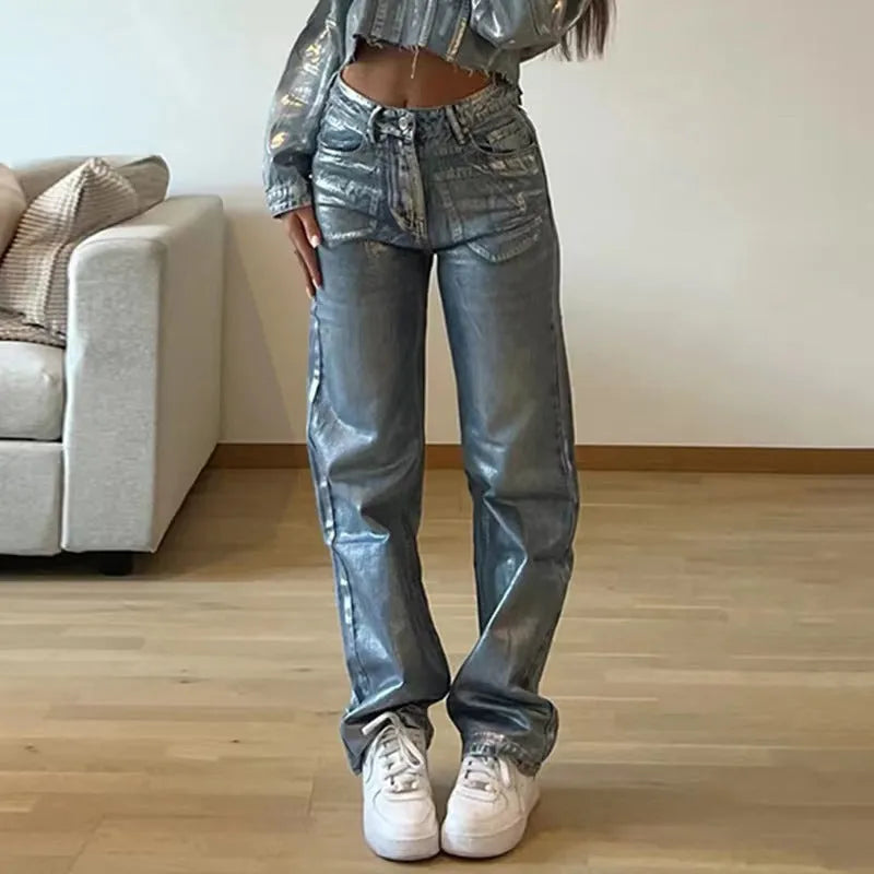 Blue straight-leg high-waist jeans with hot silver contrast detailing on denim fabric