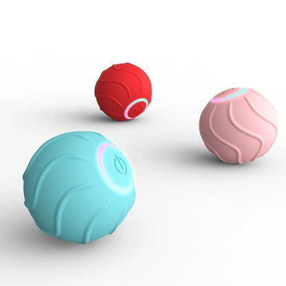 Automatic self-rolling interactive cat toy ball in blue, red, and pink colors with USB charging and bouncing action to engage cats