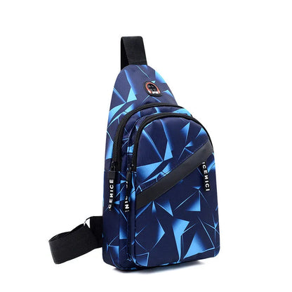 Men's sling chest bag in blue with earphone hole, crossbody strap, and zipper pockets, measuring 17cm wide.