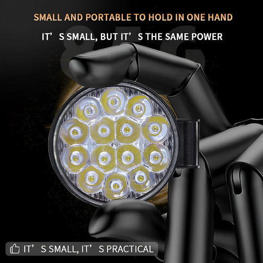 Small round white aluminium LED work light with IP67 rating for automotive use.