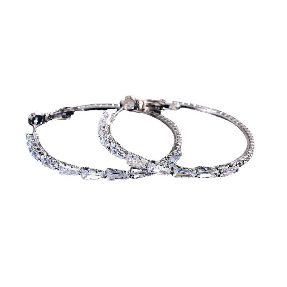 Elegant gold zircon earrings with vintage-inspired design and mixed gem inlay