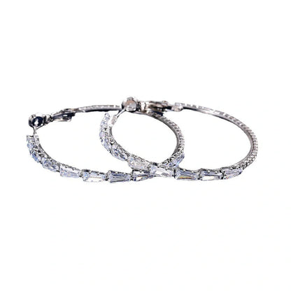 Elegant gold zircon earrings with vintage-inspired design and mixed gem inlay