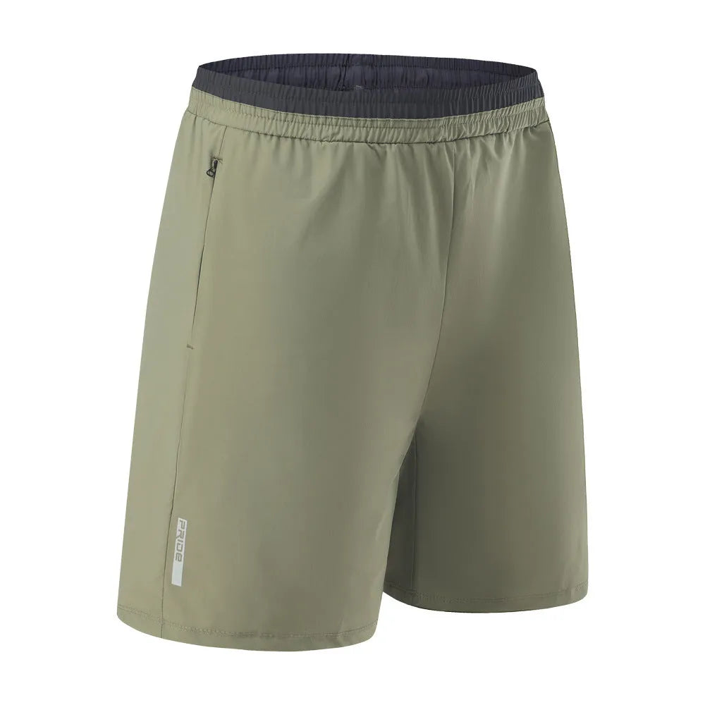 Men's loose grey ice silk cropped running pants showing the fifth pants length and relaxed fit.