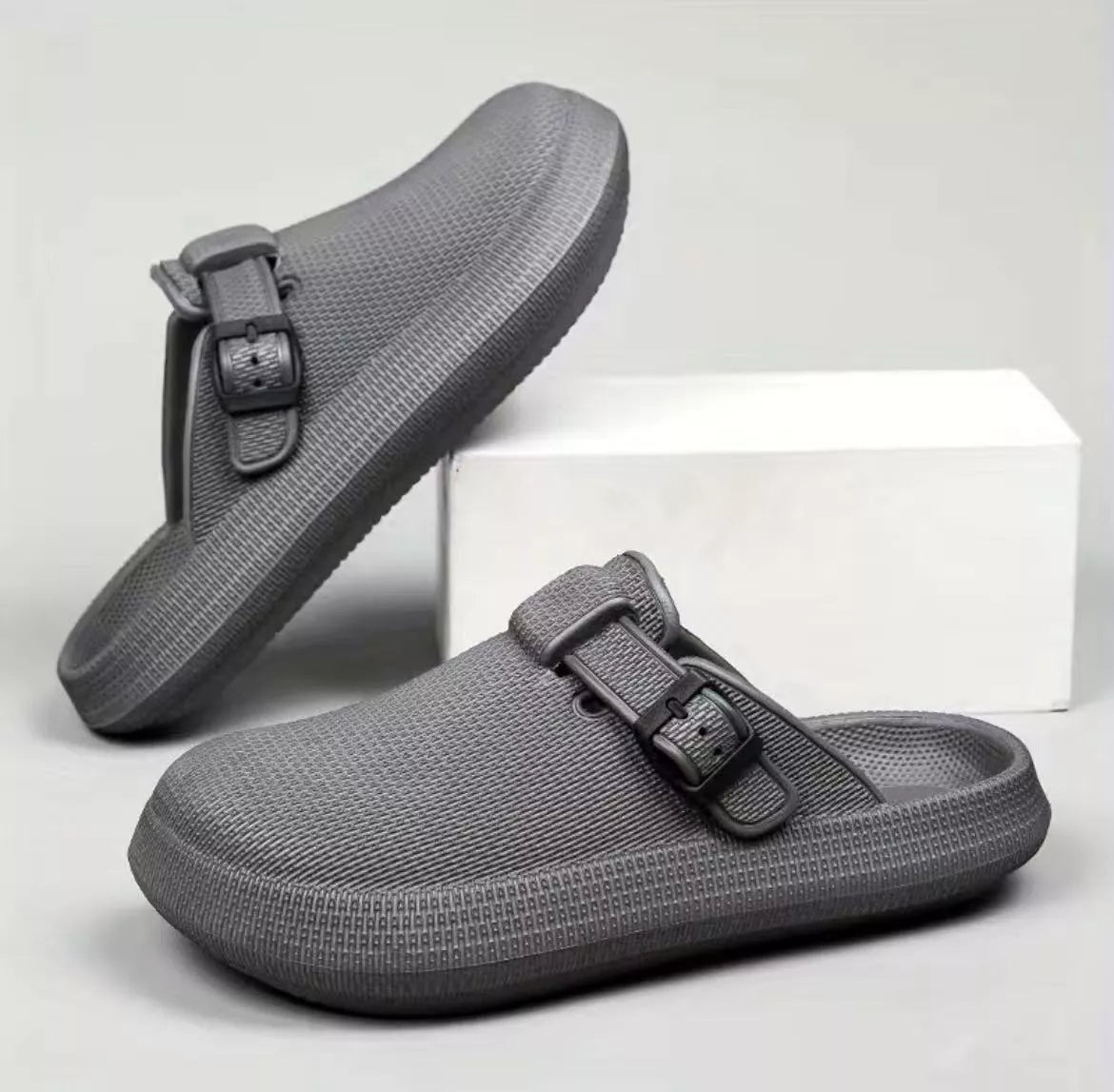 Lightweight EVA indoor home slippers in black, gray, and white
