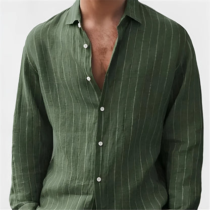 Man wearing a loose striped cardigan-style shirt with short sleeves.