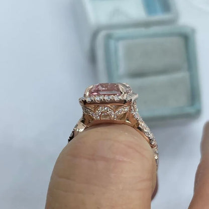 Rose gold electroplated geometric alloy ring on a white background.