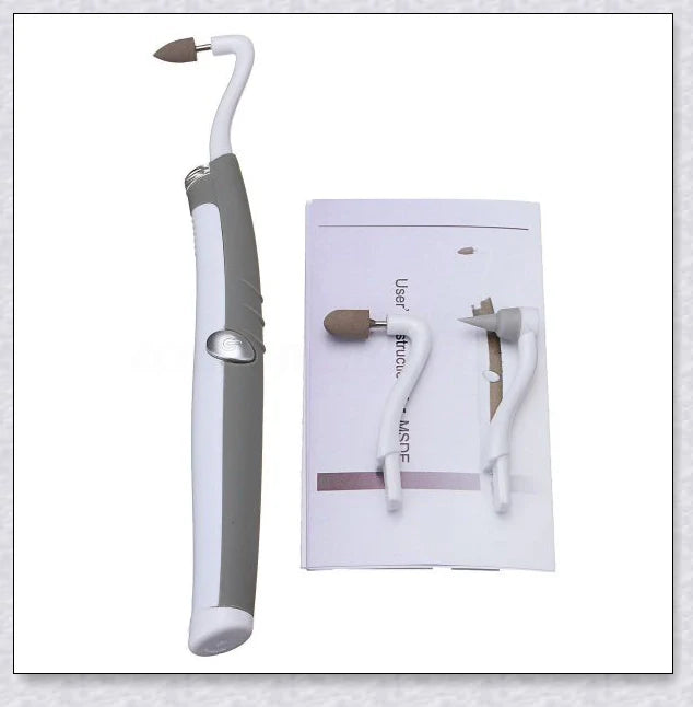 A white sonic tooth stain eraser and plaque remover with 3 different cleaning heads for removing stains and massaging gums.
