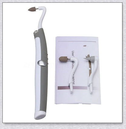A white sonic tooth stain eraser and plaque remover with 3 different cleaning heads for removing stains and massaging gums.