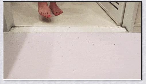 Halloween-themed color-changing bath mat that turns blood-red when wet, adding a spooky twist to any bathroom