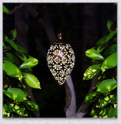 Decorative, solar-powered metal lantern for hanging in outdoor gardens, patios, and backyards