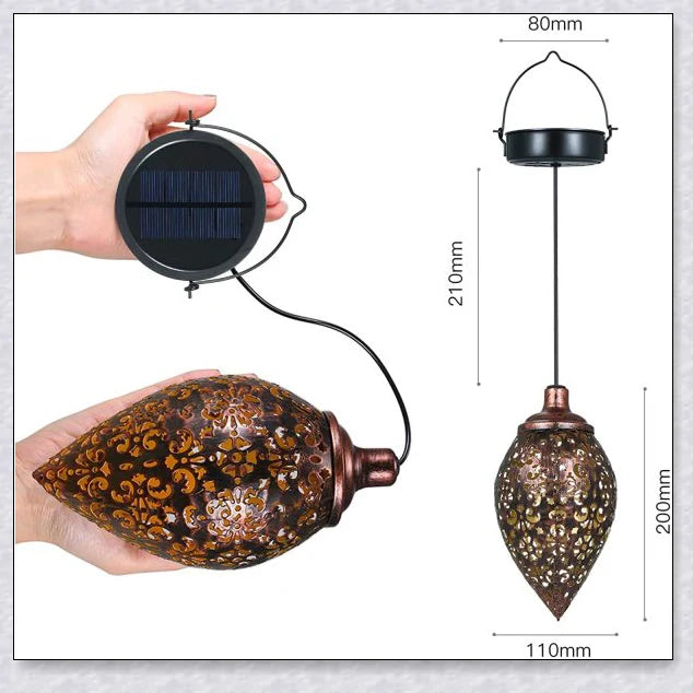 Decorative, solar-powered metal lantern for hanging in outdoor gardens, patios, and backyards