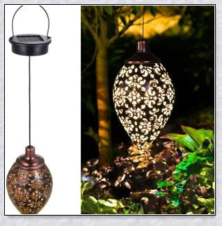 Decorative, solar-powered metal lantern for hanging in outdoor gardens, patios, and backyards