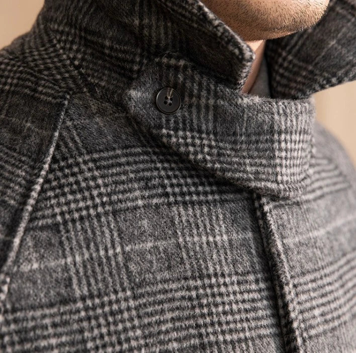 Men's wool warm mid-length coat in black grey color, featuring a classic lapel design and single-breasted front closure for a refined and stylish look.