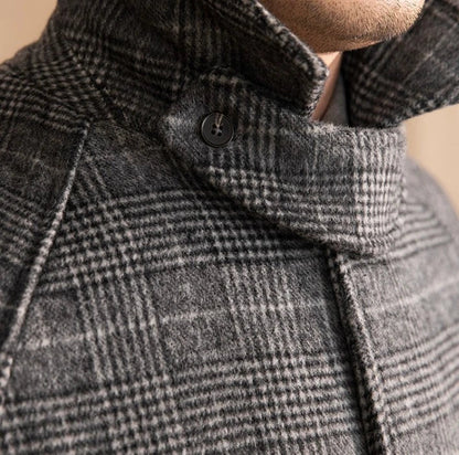 Men's wool warm mid-length coat in black grey color, featuring a classic lapel design and single-breasted front closure for a refined and stylish look.