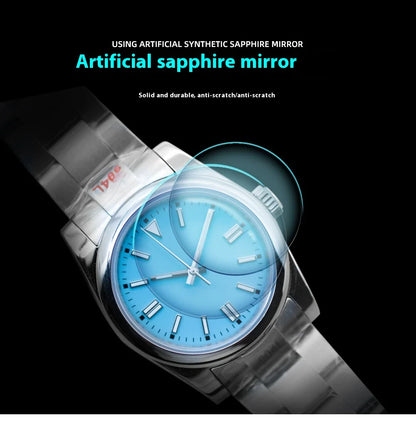 A stainless steel watch with luminous hands and indices, showcasing a sleek and sophisticated design.