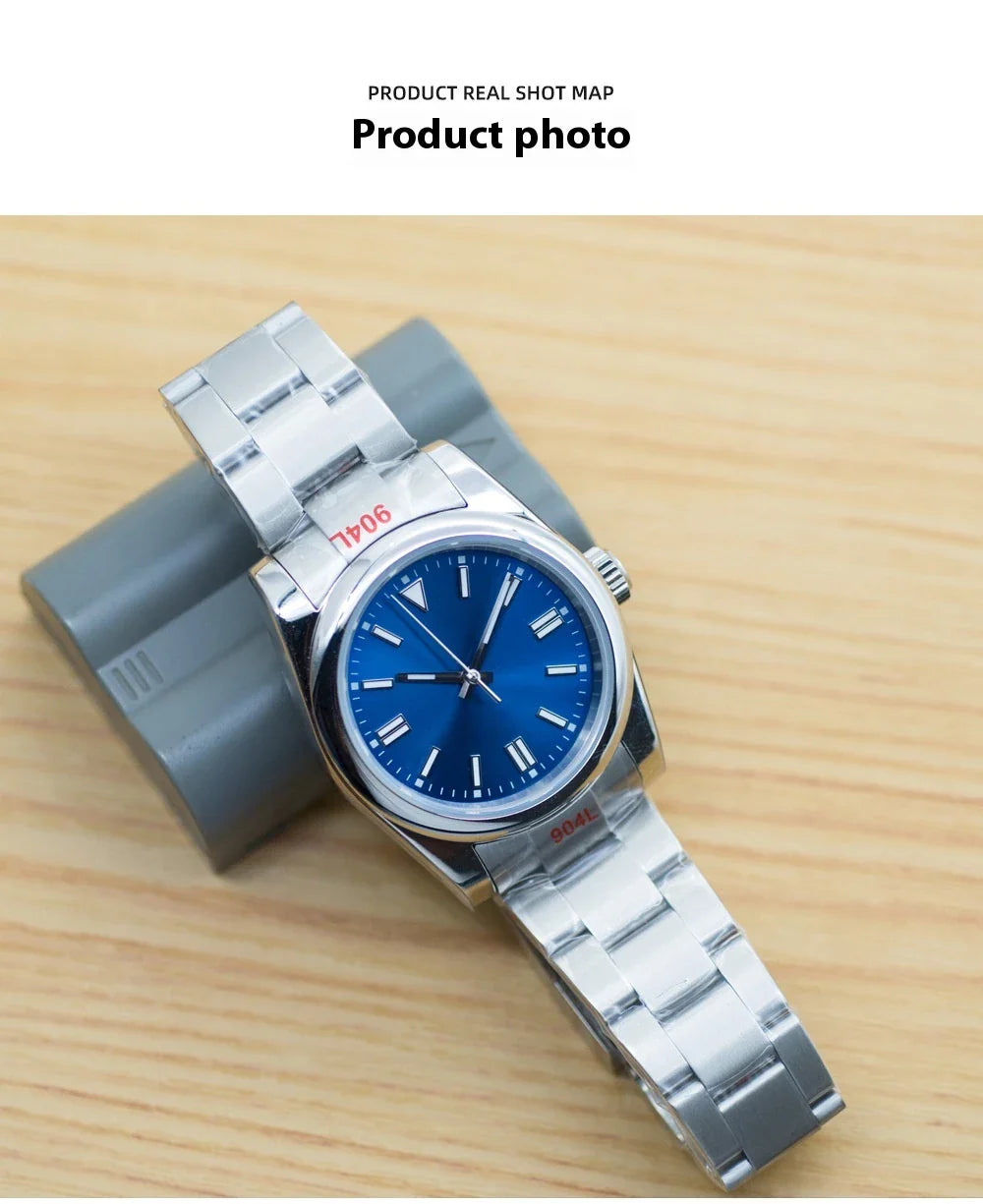 A stainless steel watch with luminous hands and indices, showcasing a sleek and sophisticated design.