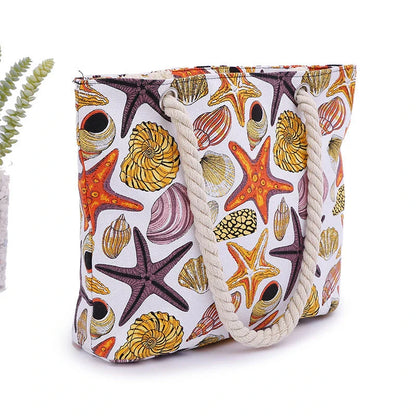 Stylish canvas beach tote bag with a charming Shells Conch print, perfect for summer adventures and everyday use.