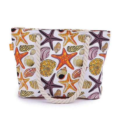 Stylish canvas beach tote bag with a charming Shells Conch print, perfect for summer adventures and everyday use.