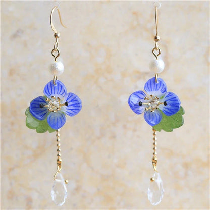 Elegant ear clips with floral and plant-inspired designs, made with premium copper and gold plating