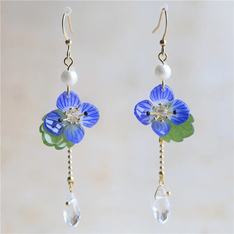 Elegant ear clips with floral and plant-inspired designs, made with premium copper and gold plating