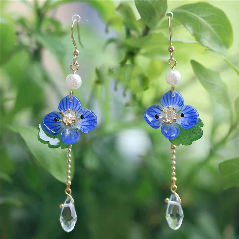 Elegant ear clips with floral and plant-inspired designs, made with premium copper and gold plating