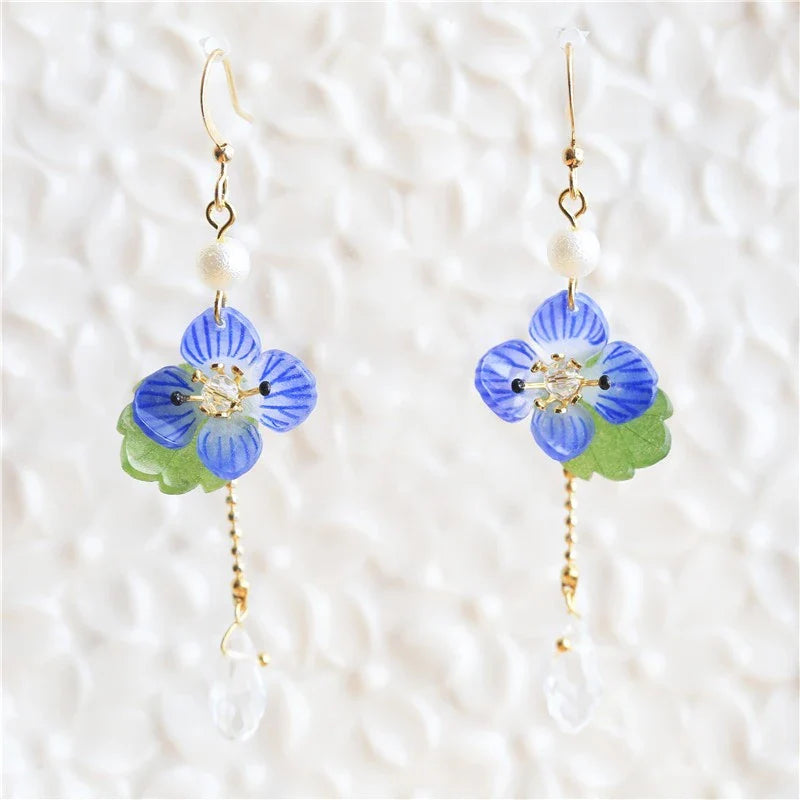 Elegant ear clips with floral and plant-inspired designs, made with premium copper and gold plating