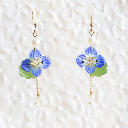 Elegant ear clips with floral and plant-inspired designs, made with premium copper and gold plating