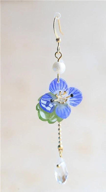 Elegant ear clips with floral and plant-inspired designs, made with premium copper and gold plating