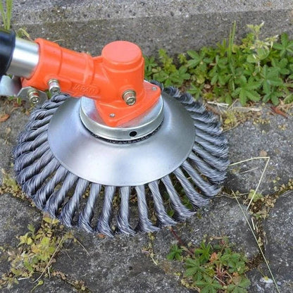 A steel wire brush designed for clearing weeds, brush, and debris from lawns, gardens, and outdoor surfaces