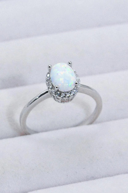 925 Sterling Silver 4-Prong Opal Ring with a dazzling opal center stone and platinum plated finish