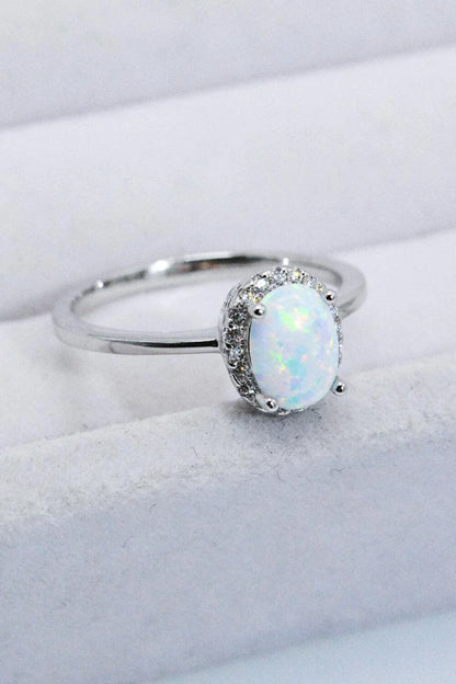 925 Sterling Silver 4-Prong Opal Ring with a dazzling opal center stone and platinum plated finish