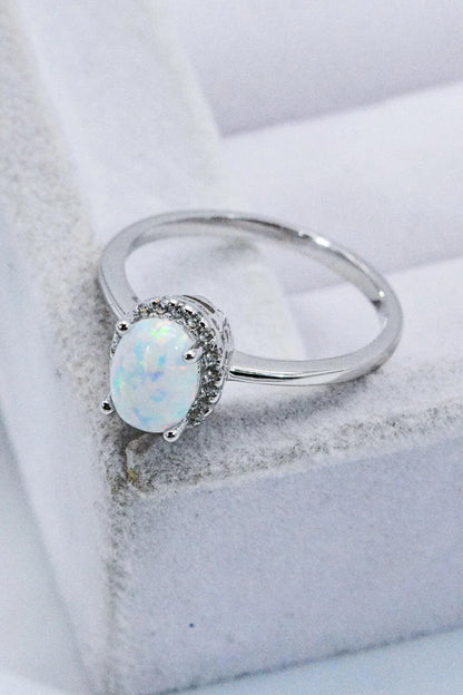 925 Sterling Silver 4-Prong Opal Ring with a dazzling opal center stone and platinum plated finish