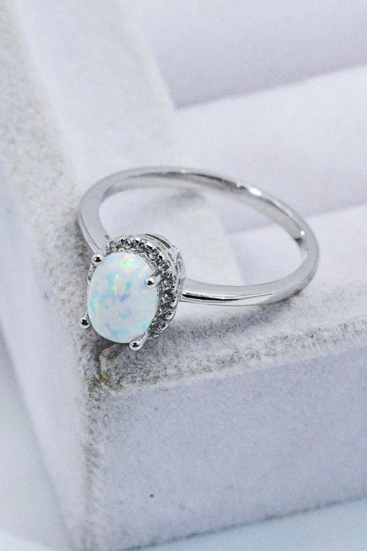 925 Sterling Silver 4-Prong Opal Ring with a dazzling opal center stone and platinum plated finish