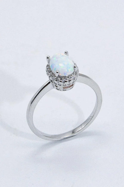 925 Sterling Silver 4-Prong Opal Ring with a dazzling opal center stone and platinum plated finish