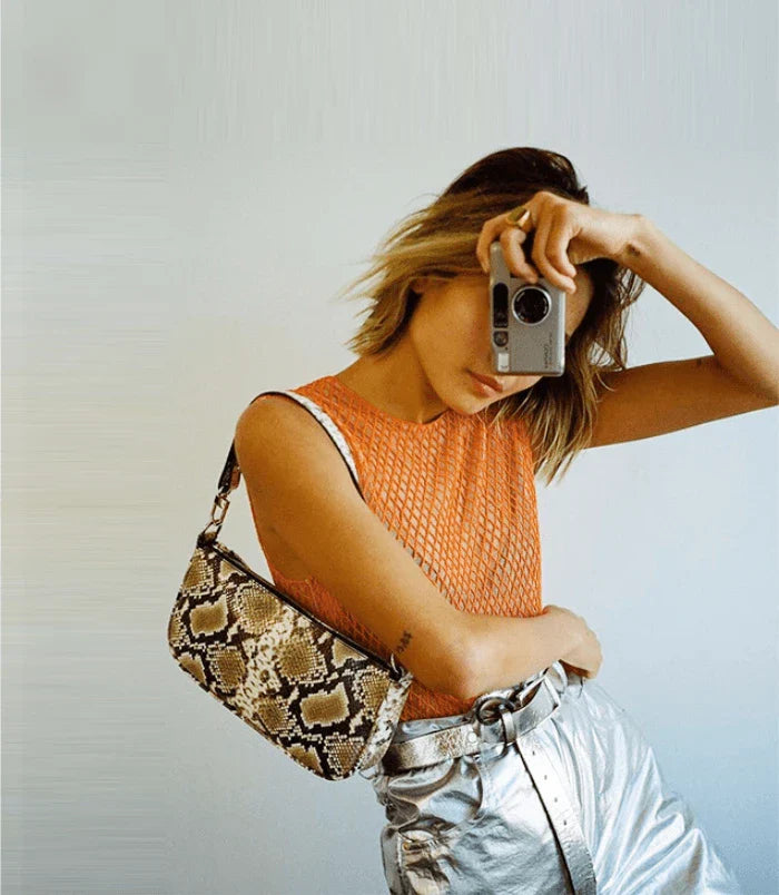 Trendy celebrity-inspired hand bag made of premium PU leather with a stylish animal print design