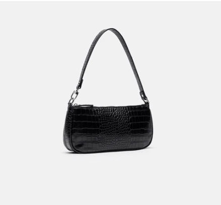 Trendy celebrity-inspired hand bag made of premium PU leather with a stylish animal print design
