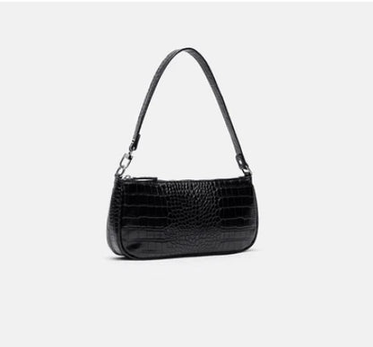 Trendy celebrity-inspired hand bag made of premium PU leather with a stylish animal print design
