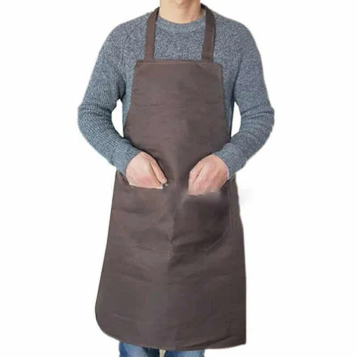 Colorful cooking apron with vibrant pattern, spacious front pocket, and adjustable neck and waist ties