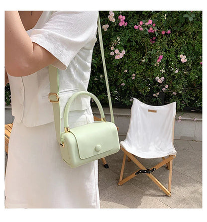 Fashionable portable square bag in various colors with a compact, minimalist design for everyday use