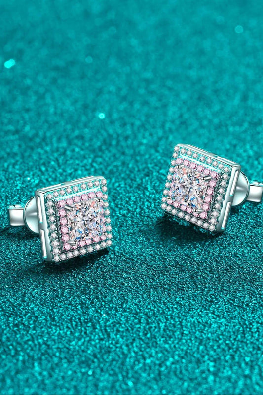 A pair of square stud earrings featuring sparkling moissanite stones set in 925 sterling silver with platinum plating.