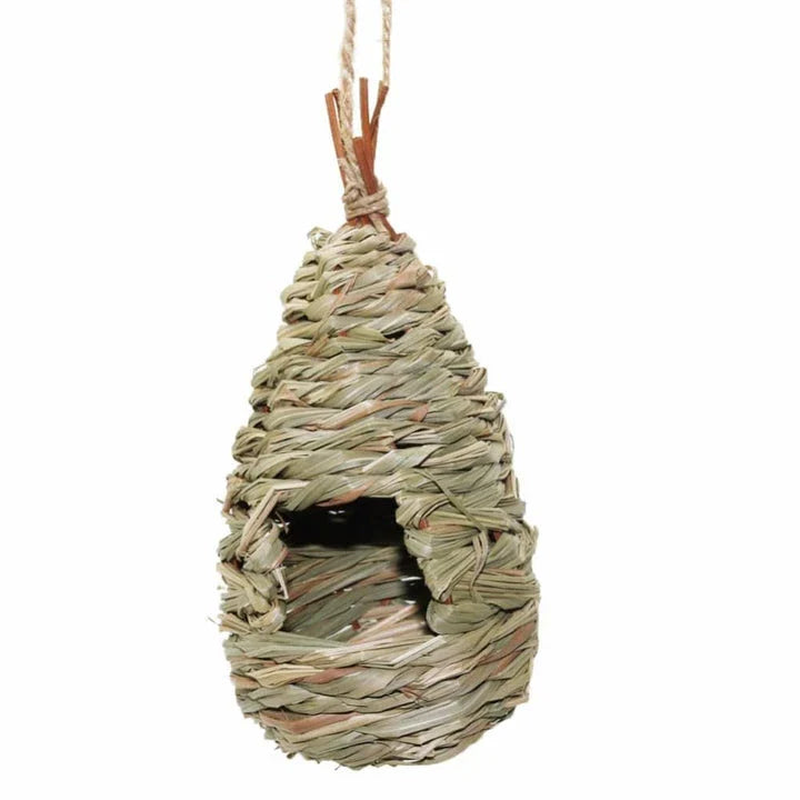 A natural straw bird nest designed to provide a cozy and secure environment for backyard birds to nest and thrive.